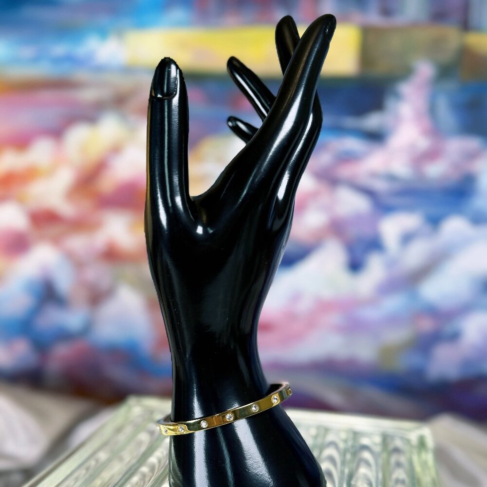 Kate Spade “Set in Stone” Hinged Goldtone Crystal Bangle